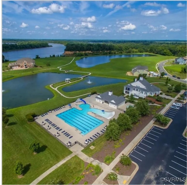 bird's eye view with a water view