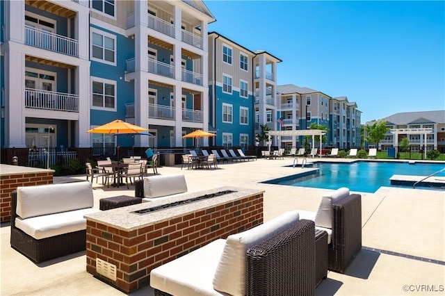 view of pool featuring a patio