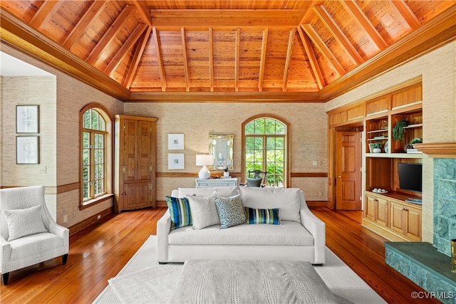 living room with wood-type flooring, high vaulted ceiling, wooden ceiling, and beam ceiling