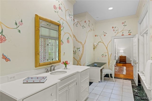 bathroom with wood-type flooring, vanity, and crown molding