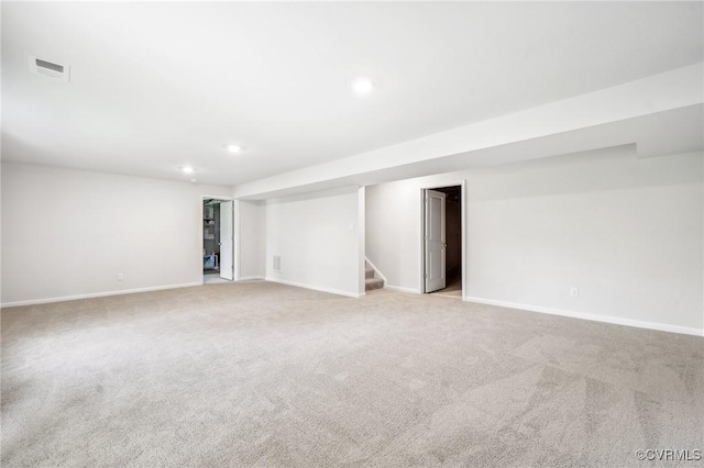 basement with light carpet