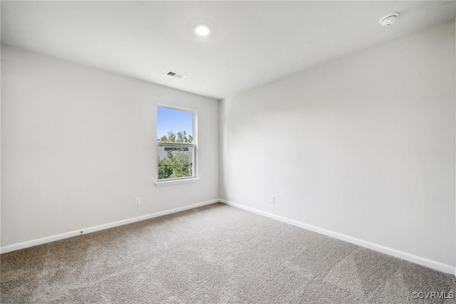 view of carpeted spare room