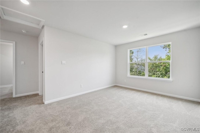 unfurnished room with carpet floors