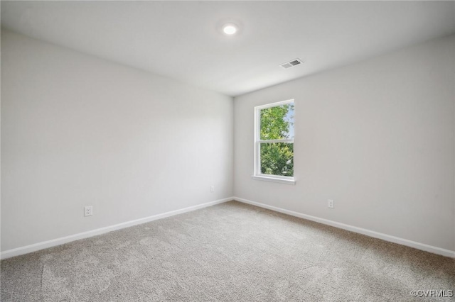 view of carpeted spare room