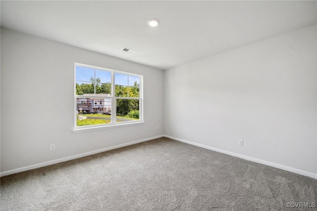 empty room featuring carpet floors