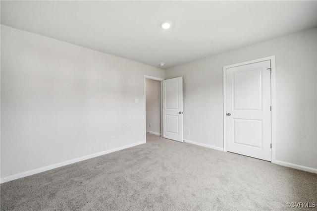 unfurnished bedroom featuring carpet flooring