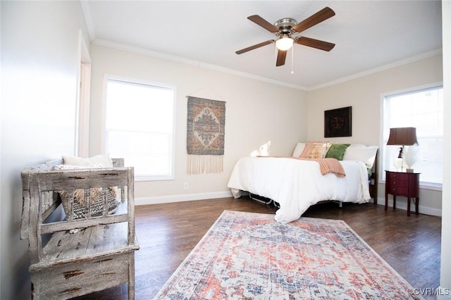 bedroom featuring ceiling fan, dark hardwood / wood-style flooring, and ornamental molding