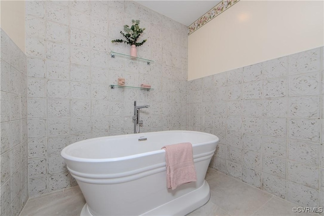 full bath with a soaking tub and tile walls