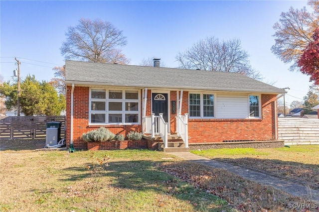 view of front of house with a front lawn