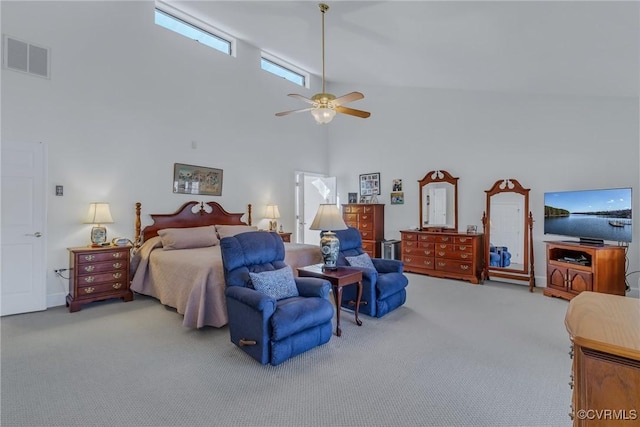 bedroom featuring carpet flooring, high vaulted ceiling, and ceiling fan