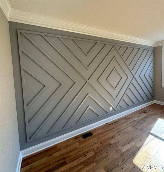 details featuring ornamental molding and wood-type flooring