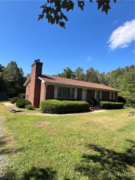 single story home featuring a front yard