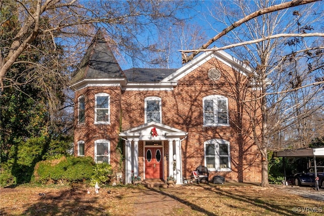 view of front facade with a carport