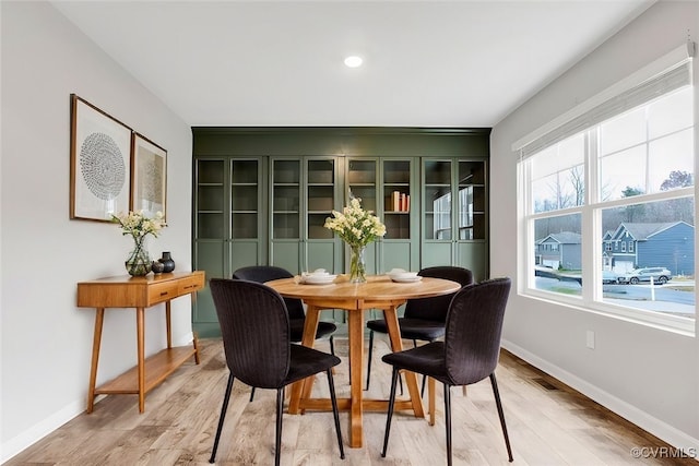 dining room featuring light hardwood / wood-style floors