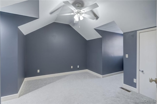 bonus room with light carpet, ceiling fan, and lofted ceiling