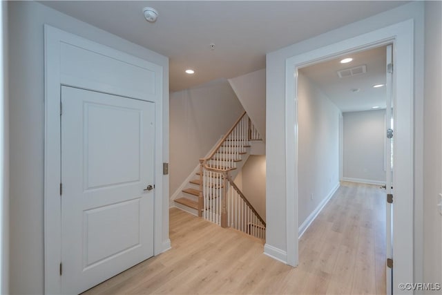 corridor featuring light wood-type flooring