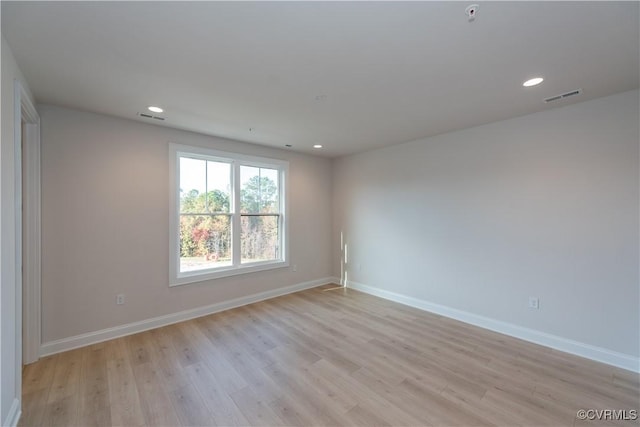 empty room featuring light hardwood / wood-style floors