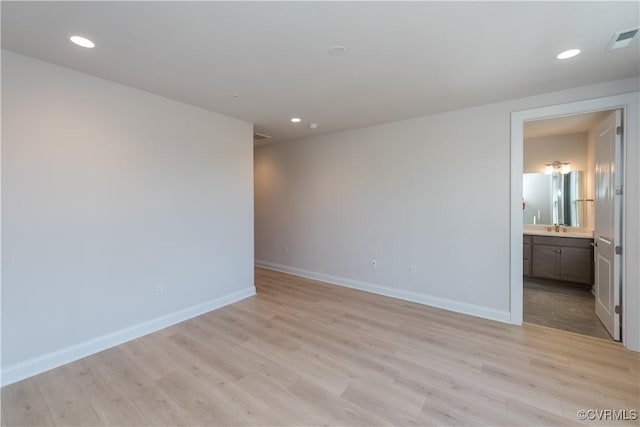 empty room featuring light wood-type flooring