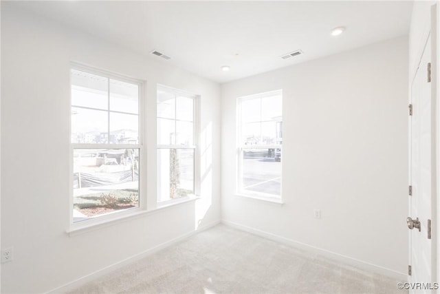 view of carpeted spare room