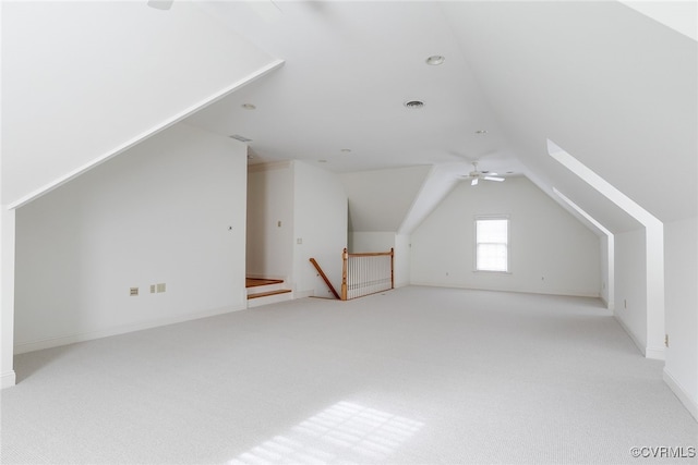 bonus room with light colored carpet, ceiling fan, and lofted ceiling