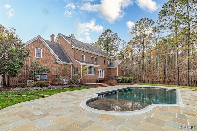 view of pool with a patio