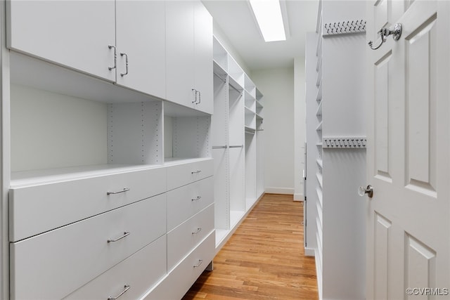 walk in closet featuring light wood-type flooring