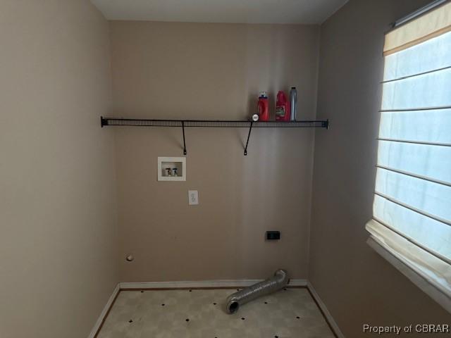 washroom with washer hookup and electric dryer hookup