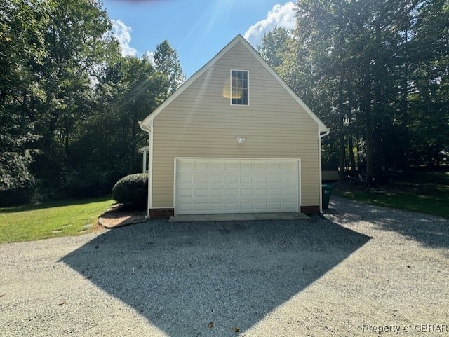 view of side of property featuring a garage