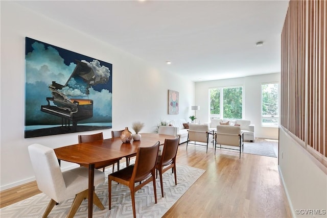 dining room featuring light hardwood / wood-style flooring