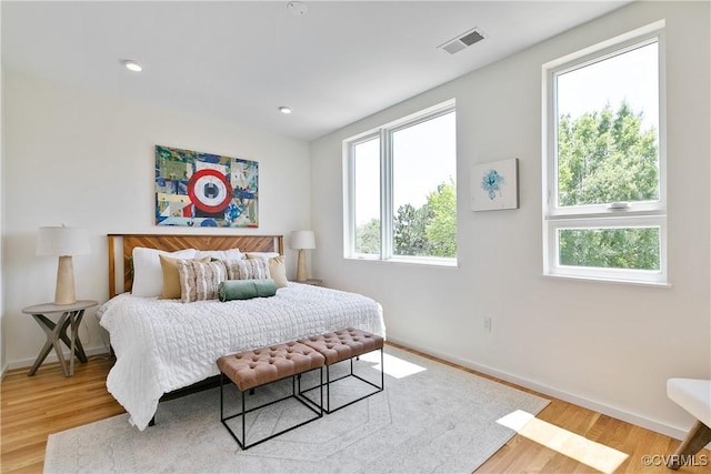 bedroom with light wood-type flooring