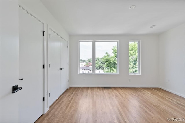 empty room featuring light hardwood / wood-style flooring