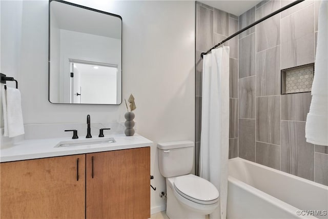 full bathroom with vanity, toilet, and shower / tub combo with curtain