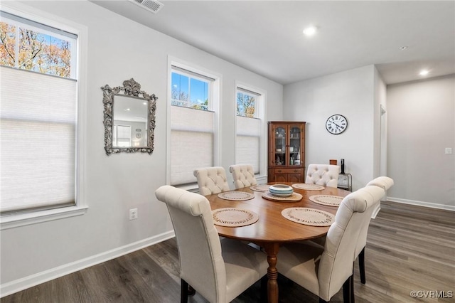 dining room featuring dark hardwood / wood-style flooring