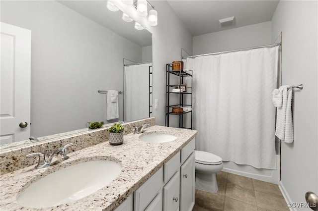 full bathroom with tile patterned floors, vanity, toilet, and shower / tub combo with curtain