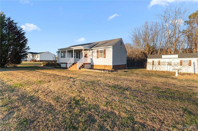 single story home featuring a front yard and a porch