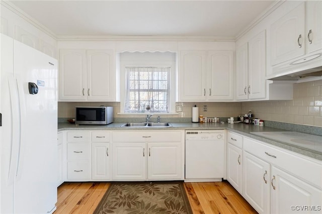 kitchen featuring light hardwood / wood-style floors, white appliances, sink, and white cabinetry