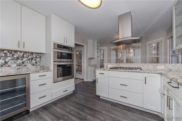 10710 Courthouse Rd, Dinwiddie, VA 23841 - kitchen featuring island range hood, white cabinetry, stainless steel appliances, and wine cooler