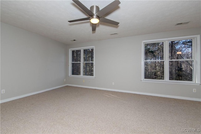 10710 Courthouse Rd, Dinwiddie, VA 23841 - empty room featuring a textured ceiling, carpet floors, and ceiling fan