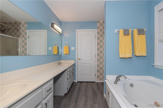 10710 Courthouse Rd, Dinwiddie, VA 23841 - bathroom with vanity, hardwood / wood-style flooring, and independent shower and bath