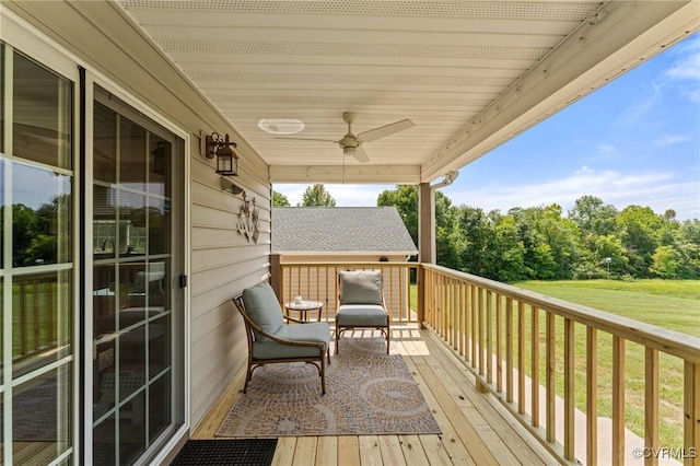 wooden deck with ceiling fan