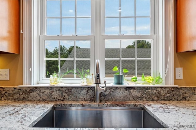 details with light stone counters and sink