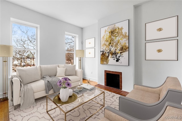 living room featuring a fireplace and light hardwood / wood-style floors