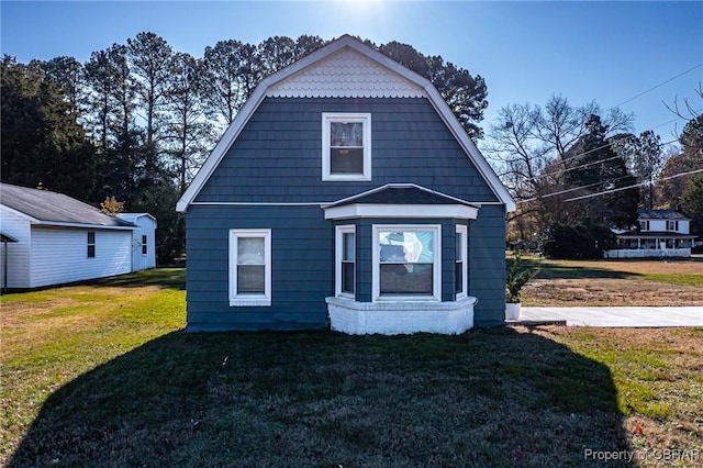 bungalow with a front yard