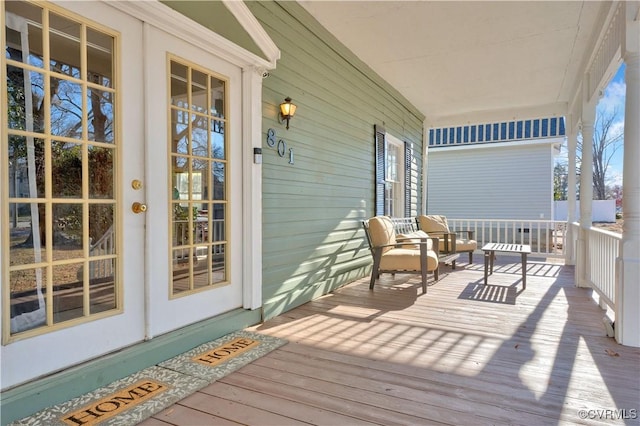 wooden deck with a porch