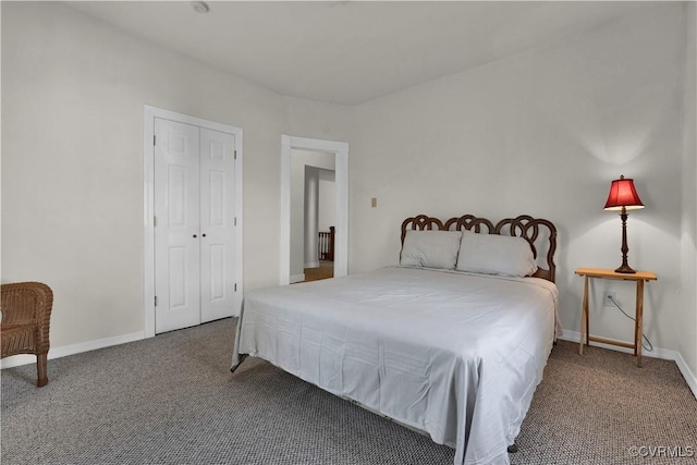 carpeted bedroom with a closet