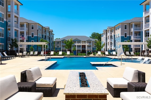 view of pool with a patio area