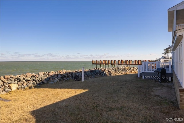 view of yard with a water view