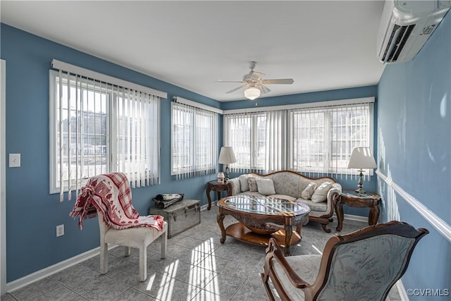 sunroom featuring a wall mounted air conditioner, plenty of natural light, and ceiling fan