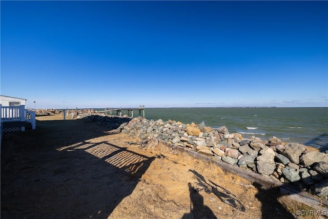 view of water feature with a beach view