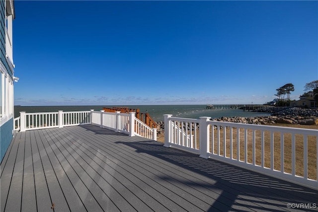 wooden terrace with a water view